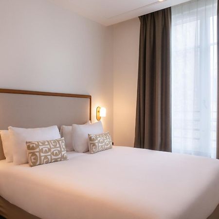Le Lampika Hotel Paris Zimmer foto